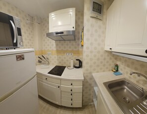 Fridge, microwave, coffee/tea maker, toaster