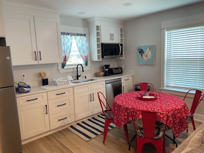 Fridge, microwave, dishwasher, coffee/tea maker