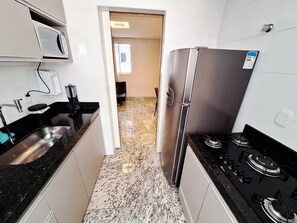 Apartment | Private kitchen | Full-size fridge, microwave, stovetop, blender