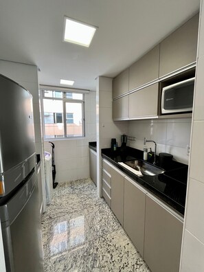 Apartment | Private kitchen | Full-size fridge, microwave, stovetop, blender