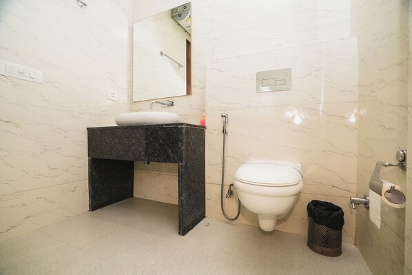 Deluxe Room | Bathroom | Shower, rainfall showerhead, free toiletries, slippers - Interglobe Oasis, Golf Course Road, Gurgaon (Gurugram)