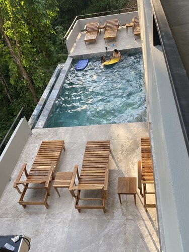 Hear the waves from either pools or patios, or walk to the beach, ocean views