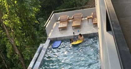 Hear the waves from either pools or patios, or walk to the beach, ocean views