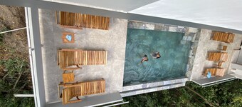 Hear the waves from either pools or patios, or walk to the beach, ocean views