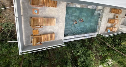 Hear the waves from either pools or patios, or walk to the beach, ocean views