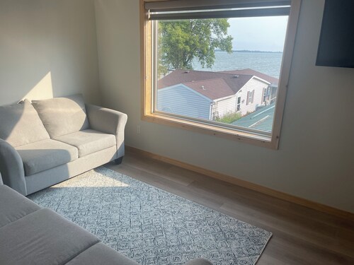 New lakeside apartment with covered parking