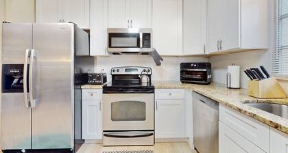 Charming dog-friendly home with patio, grill, central AC, & W/D