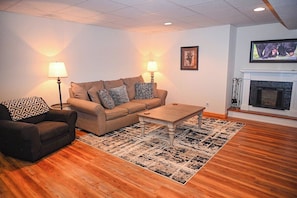 Smart TV, fireplace, foosball