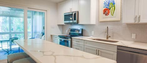 Fridge, microwave, dishwasher, coffee/tea maker