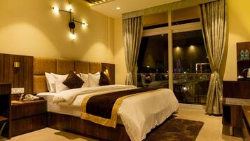 Deluxe Room | 1 bedroom, desk, bed sheets