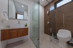 Shower, hair dryer, towels, soap