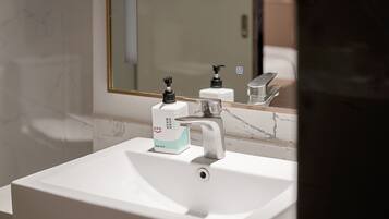 Rainfall showerhead, designer toiletries, hair dryer, bathrobes