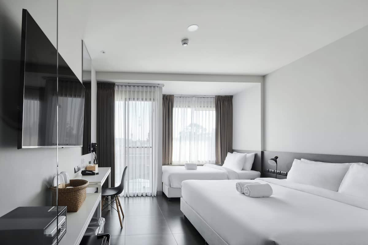 Triple Room | Free minibar, in-room safe, desk, blackout drapes