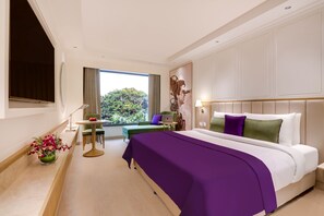 Ropa de cama de alta calidad, minibar, caja fuerte y escritorio