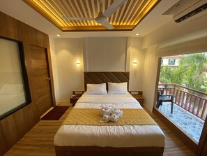Deluxe Room | Premium bedding, desk, bed sheets - DAN Resorts & Weddings (Dahanu)