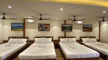 Superior Quadruple Room | Premium bedding, desk, bed sheets