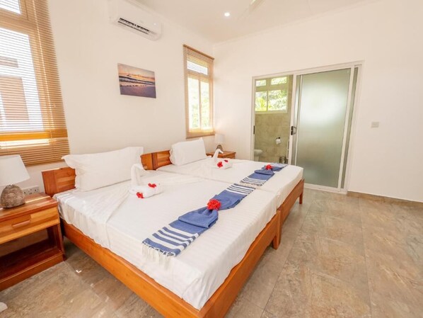 2 bedrooms, iron/ironing board, WiFi, bed sheets - MacMillan's Holiday Villas await you offering a modern living space (Grand Anse Praslin)