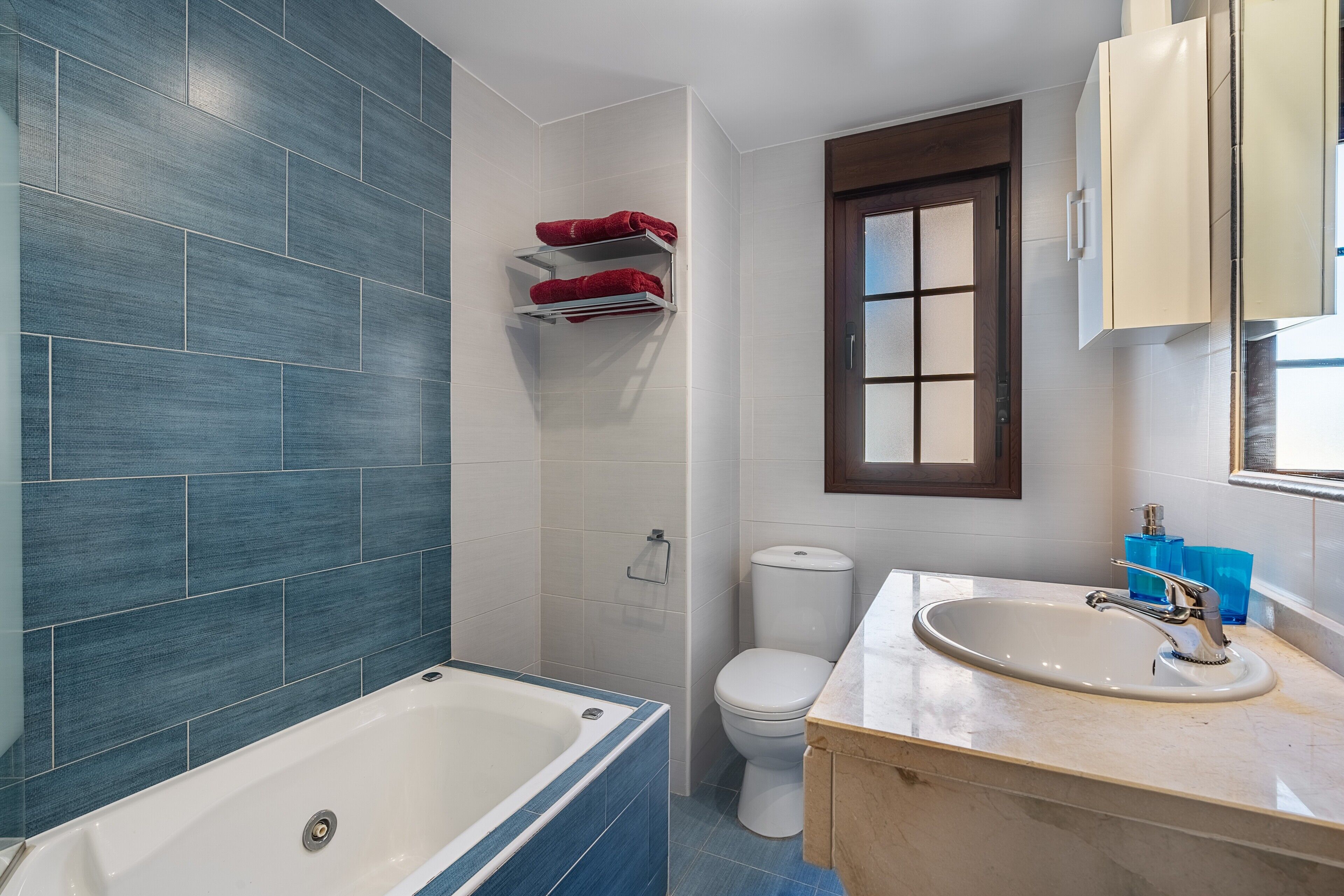 Bathtub, hair dryer, towels