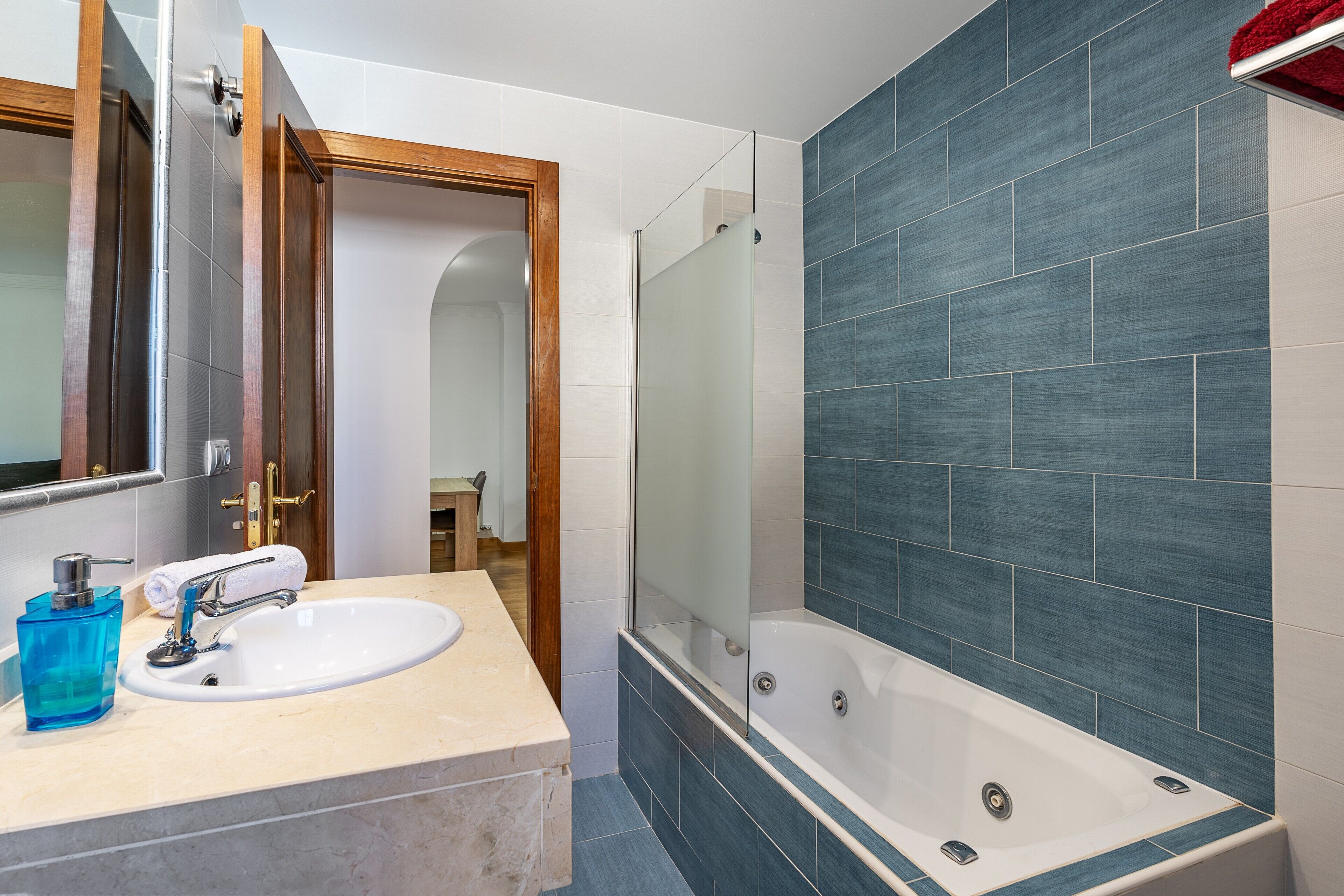 Bathtub, hair dryer, towels
