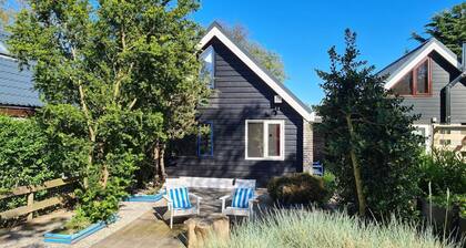 Belkmerduinen 23 is in aquiet location surrounded by greenery and trees.