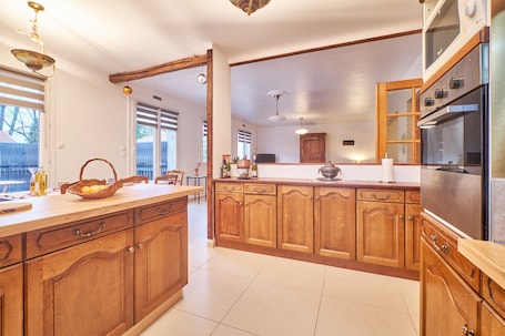 Fridge, microwave, oven, stovetop. Vacation Home "Chez Emile" with Mountain View, Private Terrace & Wi-Fi