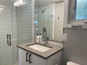 Shower, towels, soap, shampoo