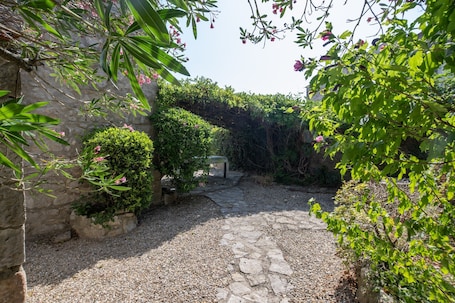 Property grounds. Holiday Home 'Belle Maison En Pierre' with Private Pool, Private Terrace and Private Garden