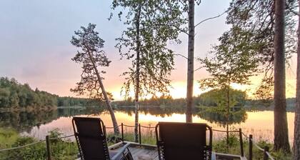 Cozy lodge surrounded by lake