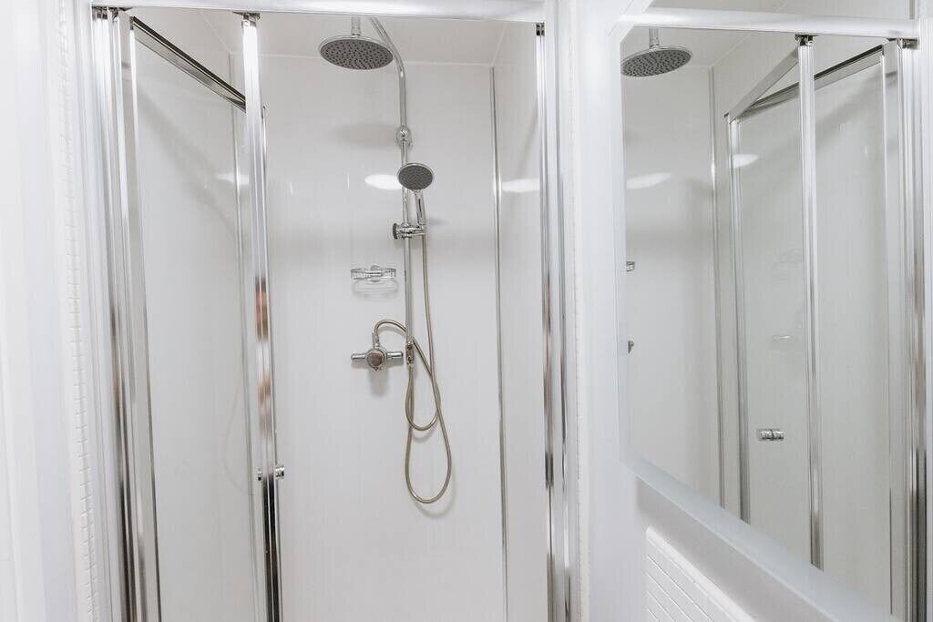 Bathtub, hair dryer, towels