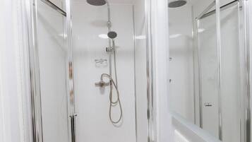 Bathtub, hair dryer, towels