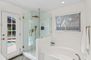 Bathtub, hair dryer, towels