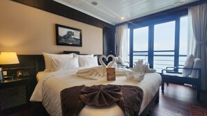 Premium bedding, pillow-top beds, minibar, in-room safe
