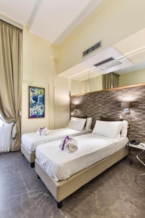 Superior Double or Twin Room | Premium bedding, down duvets, memory-foam beds, minibar - Boutique Hotel Piazza Carità (Naples)