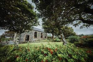 Property grounds - The Old Church. Three bedroom property with sea views and luxurious interiors. (Isle of Skye)