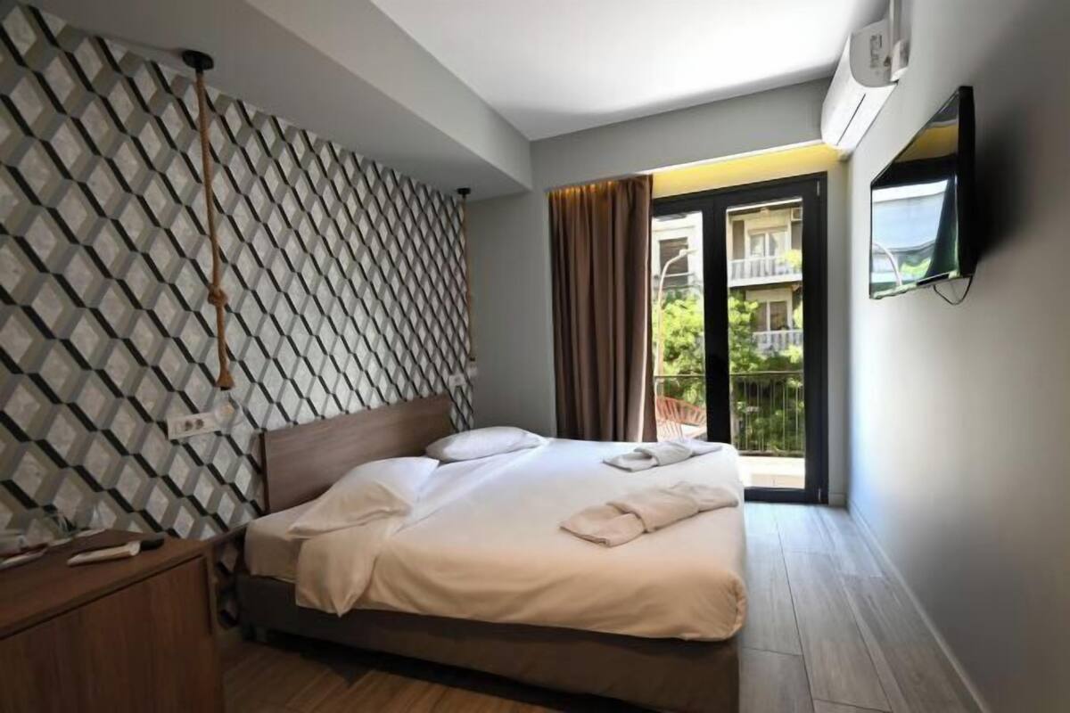 1 chambre, bureau, fer et planche à repasser, Wi-Fi gratuit