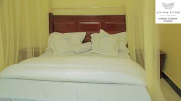 Desk, laptop workspace, free WiFi, bed sheets