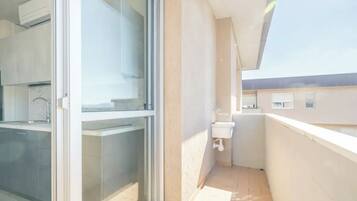 Asciugacapelli, bidet, asciugamani, sapone