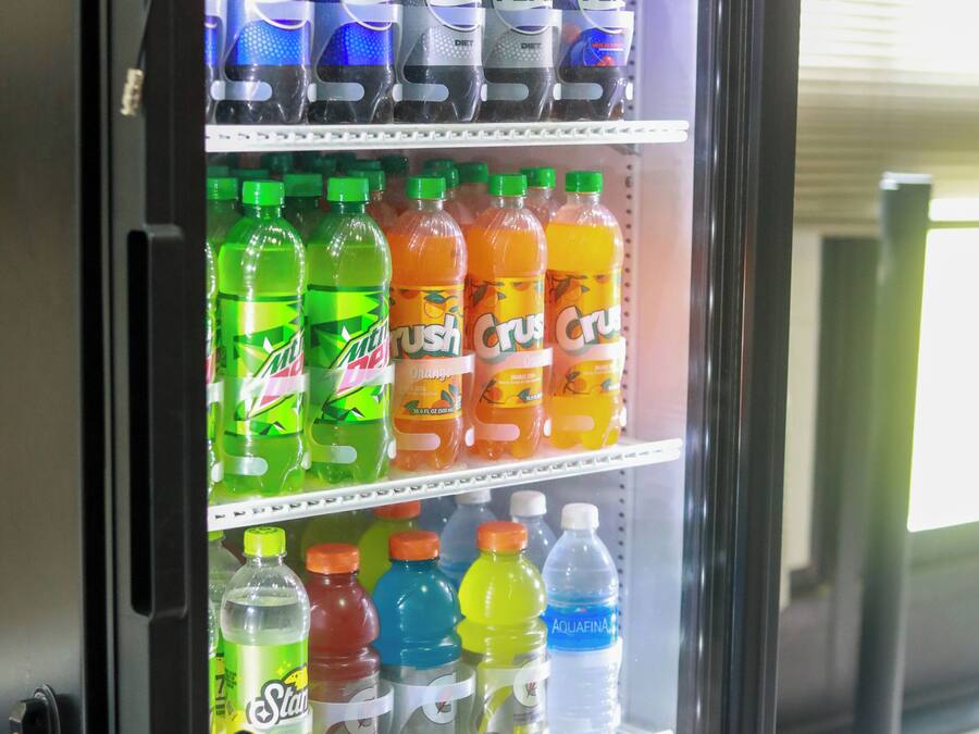 A vending machine with various beverages including Pepsi, Mountain Dew, and other sodas.