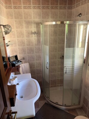 Shower, hair dryer, towels, soap