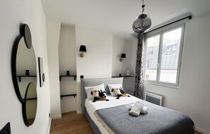 1 chambre, fer et planche à repasser, Wi-Fi gratuit, draps fournis