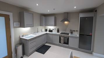 Fridge, microwave, oven, cookware/dishes/utensils