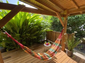 Terrace/patio - Kaz Ananas , spa Privatif ,plage du Helleux (Sainte-Anne)