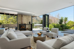 Luxury Villa | Living area | 60-inch flat-screen TV with cable channels, streaming services