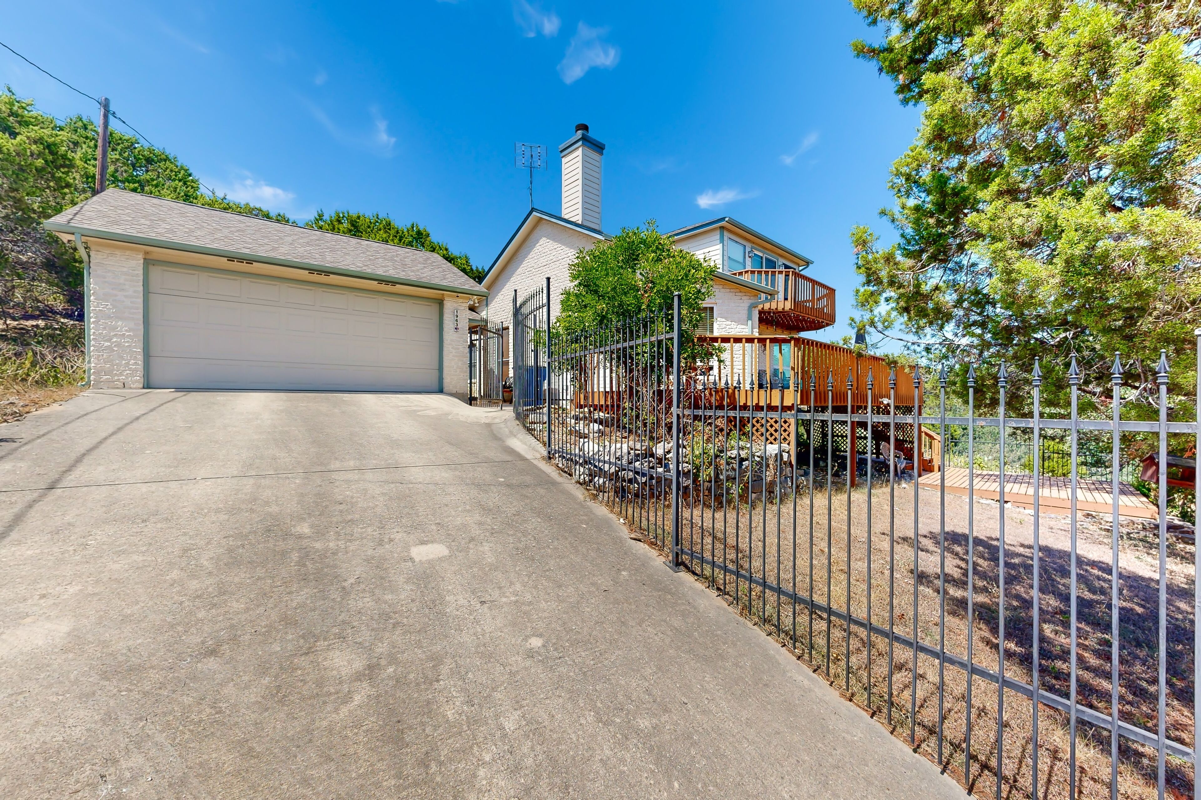Inviting and charming home with water views & wraparound deck