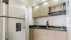 Coffee/tea maker, fridge, stovetop, cookware/dishes/utensils - Upper Floor Apartment (Torices)