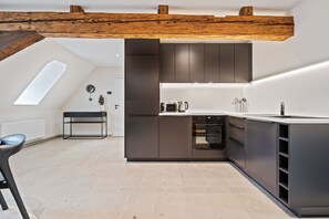 Apartment | Private kitchen | Fridge, oven, stovetop, dishwasher