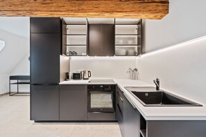 Apartment | Private kitchen | Fridge, oven, stovetop, dishwasher