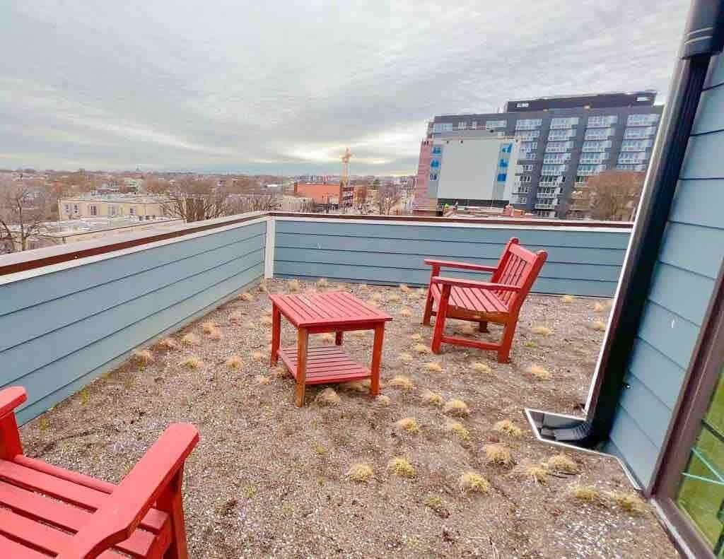 Luxurious top-floor loft with a private rooftop deck.