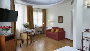 Suite ejecutiva | 1 dormitorio, caja fuerte, wifi gratis y ropa de cama