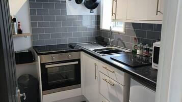 Apartment | Private kitchen | Fridge, microwave, oven, stovetop